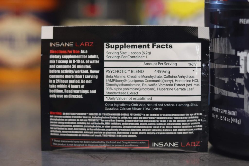 back label of insane labz psychotic pre-workout showcasing supplement facts, directions for use, and warning label