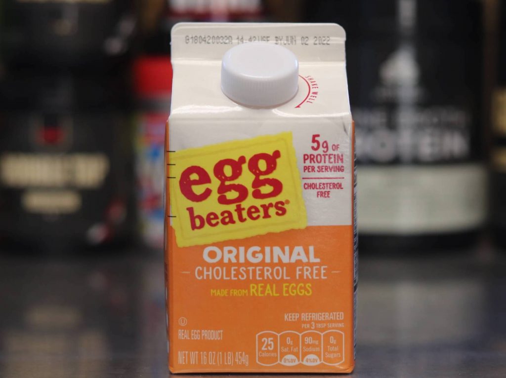 orange 16 ounce carton of egg beaters reading 5g of protein per serving, original cholesterol free, made from real eggs