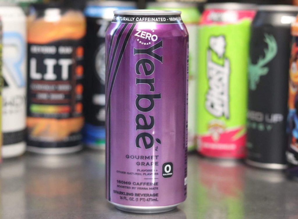 closeup of purple can of yerbae gourmet grape energy drink with background of 7 other energy drink brands